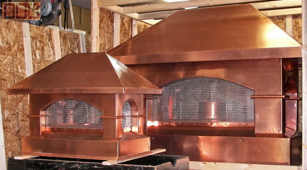 The Tuscan style copper chimney caps set of 2 for my client Matovich in Setauket, New Jersey