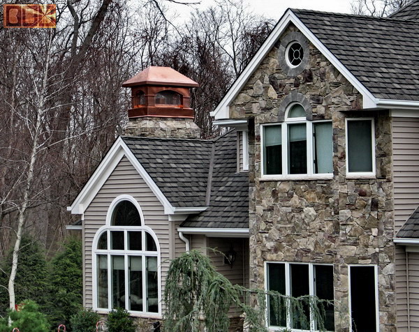 A Tuscan style copper chimney cap set of 2 for Matovich in Setauket, New Jersey