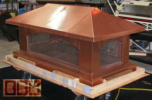 A sudo Tuscan style copper chimney cap for Reeves in Springfield, Illinois